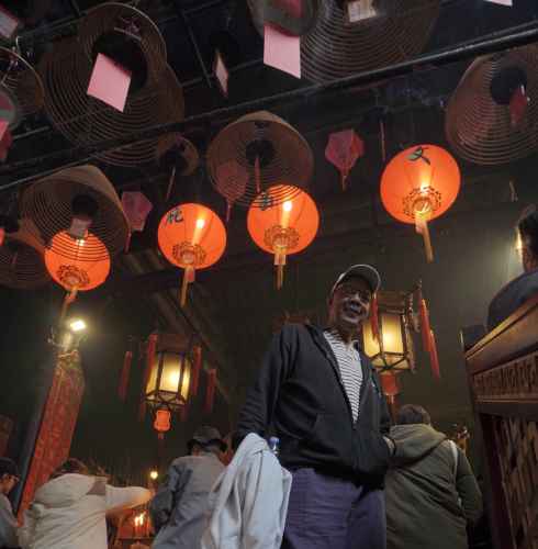 Embraced by Tradition: A Visitor's Awe in Red Lantern Light