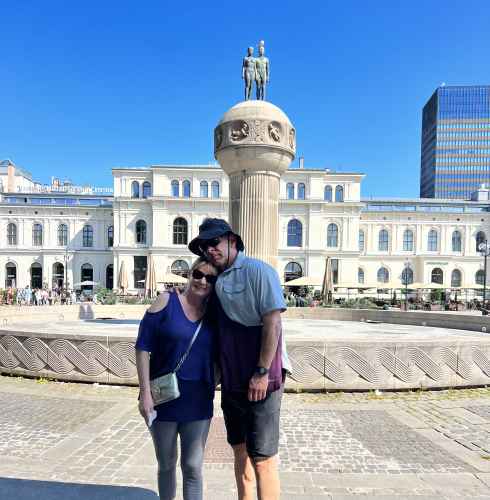 Embraced by Summer: A Charming Moment in the City Square