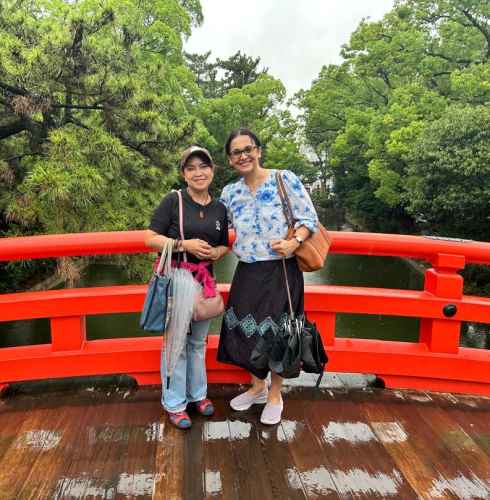 Memories on a Vibrant Red Bridge