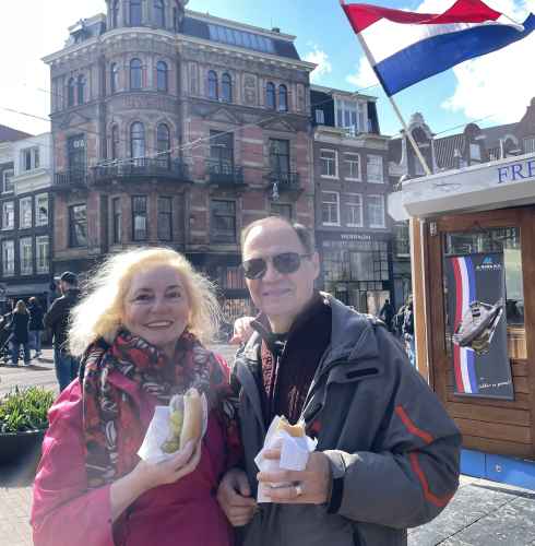 View of a man and woman by Hefferich building, Amsterdam.