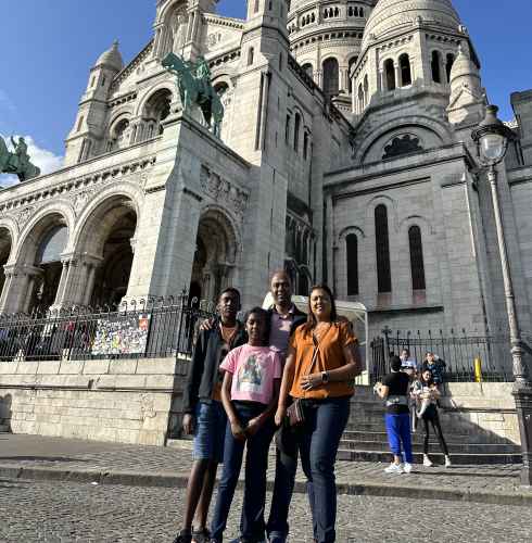 Group of people in front of Sacré-Cœur Basilica, Paris.