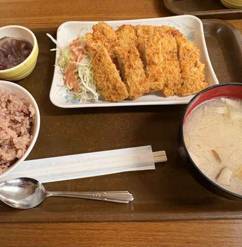 Savoring a cozy meal of katsu and miso soup in Naha.