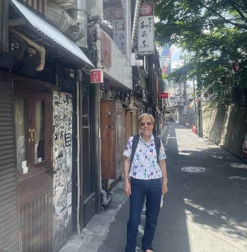 Strolling through Tokyo's narrow lanes under a lazy afternoon sun.