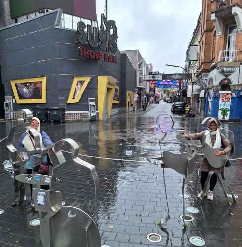 Amusing street sculptures brighten a rainy day in Hamburg.