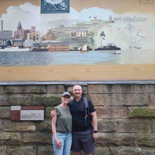 Historic Whispers on a Vibrant Wall