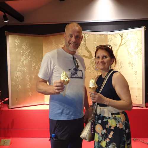 Ice Cream Smiles Under a Dappled Gold Screen