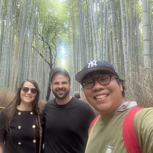 Bamboo Bliss: Friends Embracing Nature's Majesty