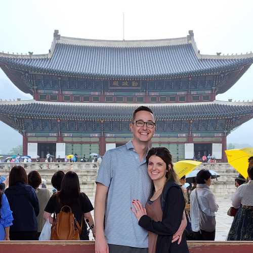 Smiles and Umbrellas at the Grandeur