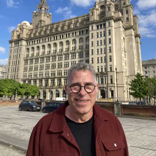 Smiles Beneath the Iconic Clock Tower