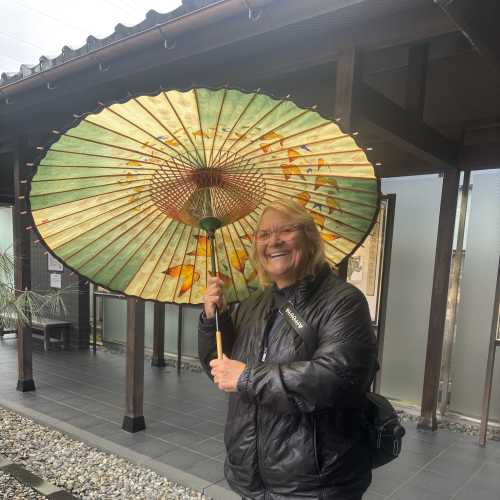 Joyful Stroll Under the Painted Parasol