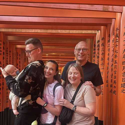 Family Moments at the Vibrant Torii Tunnel