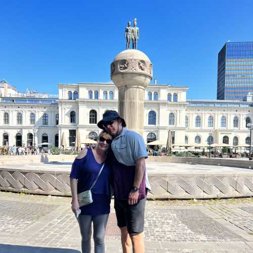 Embraced by Summer: A Charming Moment in the City Square