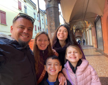 Family Smiles Under Italy’s Archways
