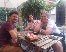 A Garden Table, a Plate of Prosciutto, and Smiles All Around