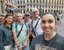 Smiling together in a beautiful European square