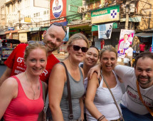 Sharing laughs in the heart of a vibrant Thai market street