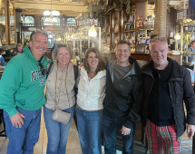Joy and Laughter Over Drinks Among Friends