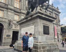 Majestic Moments Beneath Historic Statues