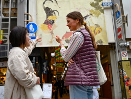 Traveler enjoying a guided Kyoto food tour Traveler enjoying a guided Kyoto food tour
