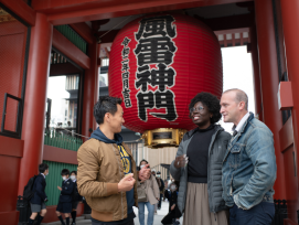 Tour guide with guests at Fushimi Inari Shrine Tour guide with guests at Fushimi Inari Shrine