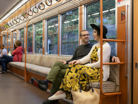 Couple traveling by train to visit Tokyo Couple traveling by train to visit Tokyo