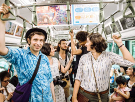 Travelers on a train from Kyoto station