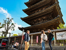 Tourists on a tour in Kyoto, Japan Tourists on a tour in Kyoto, Japan
