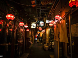 Narrow alley lined with small bars and lanterns in Soemon-cho at night. Narrow alley lined with small bars and lanterns in Soemon-cho at night.
