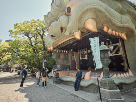 Lion-shaped Namba Yasaka Shrine structure with its dramatic face and gaping mouth. Lion-shaped Namba Yasaka Shrine structure with its dramatic face and gaping mouth.