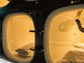 Modern capsule hotel interior showing individual sleeping pods with privacy screens photo by Shutterstock Modern capsule hotel interior showing individual sleeping pods with privacy screens photo by Shutterstock