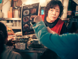 An elderly vendor at a small kushikatsu stall carefully preparing fried skewers while customers wait at the narrow counter Photo by Paul Bill on Unsplash An elderly vendor at a small kushikatsu stall carefully preparing fried skewers while customers wait at the narrow counter Photo by Paul Bill on Unsplash
