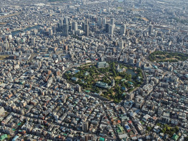 Overhead shot of Osaka's cityscape with distinct districts visible Overhead shot of Osaka's cityscape with distinct districts visible