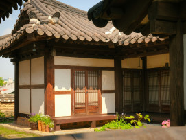 Traditional tea house exterior with wooden facade and noren curtain Photo by Minku Kang on Unsplash Traditional tea house exterior with wooden facade and noren curtain Photo by Minku Kang on Unsplash