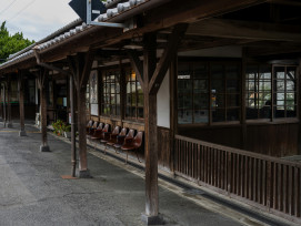 Local train station platform with commuters and traditional architecture visible Photo by Kouji Tsuru on Unsplash Local train station platform with commuters and traditional architecture visible Photo by Kouji Tsuru on Unsplash