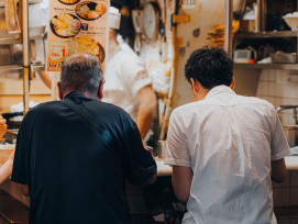Customer eating fire ramen. Photo by Oonrclkk on pexels Customer eating fire ramen. Photo by Oonrclkk on pexels