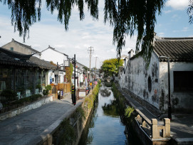 Traditional sake brewery buildings reflected in a canal. Photo by Joe Yu on Unsplash Traditional sake brewery buildings reflected in a canal. Photo by Joe Yu on Unsplash