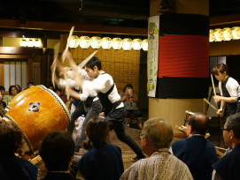 Traditional performing arts taking place in a contemporary Kyoto venue with audience engagement Photo by Arthur Tseng on Unsplash