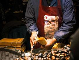 Seasonal persimmons and chestnuts on a traditional wooden tray Photo by Denisa-Elena Ficau on Unsplash