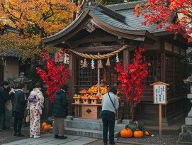 Small neighborhood shrine with autumn offerings and worshippers Small neighborhood shrine with autumn offerings and worshippers