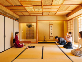 Traditional tea ceremony room with tatami mats and hanging scroll. Traditional tea ceremony room with tatami mats and hanging scroll.