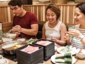 Guests enjoying Japanese food. Guests enjoying Japanese food.