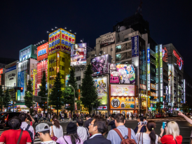 Akihabara city at night with many tourists