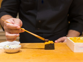 Sushi chef preparing sushi in Tokyo