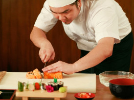 Sushi chef preparing sushi in Tokyo, Japan