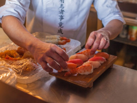 Assortment of sushi being prepared in Tokyo, Japan