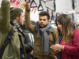Tourists on a highway bus, Japan