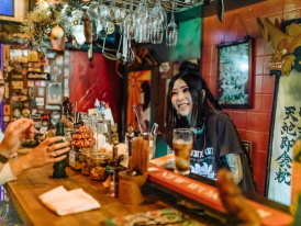 Visit an izakaya in Osaka at night
