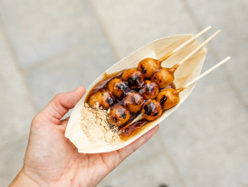 Traditional mitarashi dango with golden glaze.