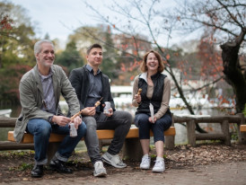 Tourists in light jackets enjoying perfect spring weather in Tennoji Park