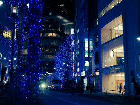 Illuminated street near Umeda Sky Building in December. Image by Yuika Takamura from Unsplash